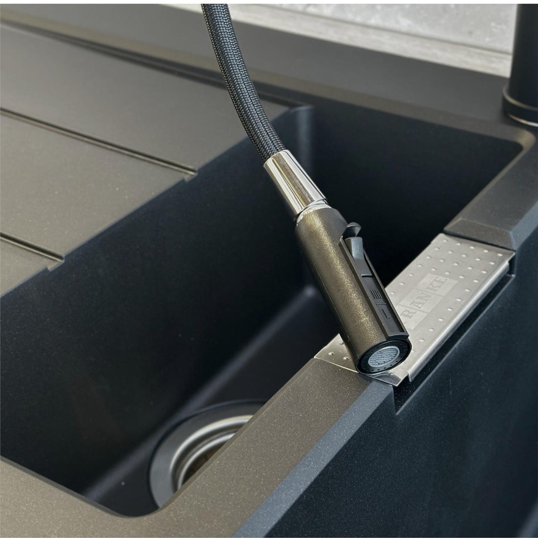 Liquida black 1.0 bowl kitchen sink with reversible drainer and pull out spray tap lifestyle kitchen setting