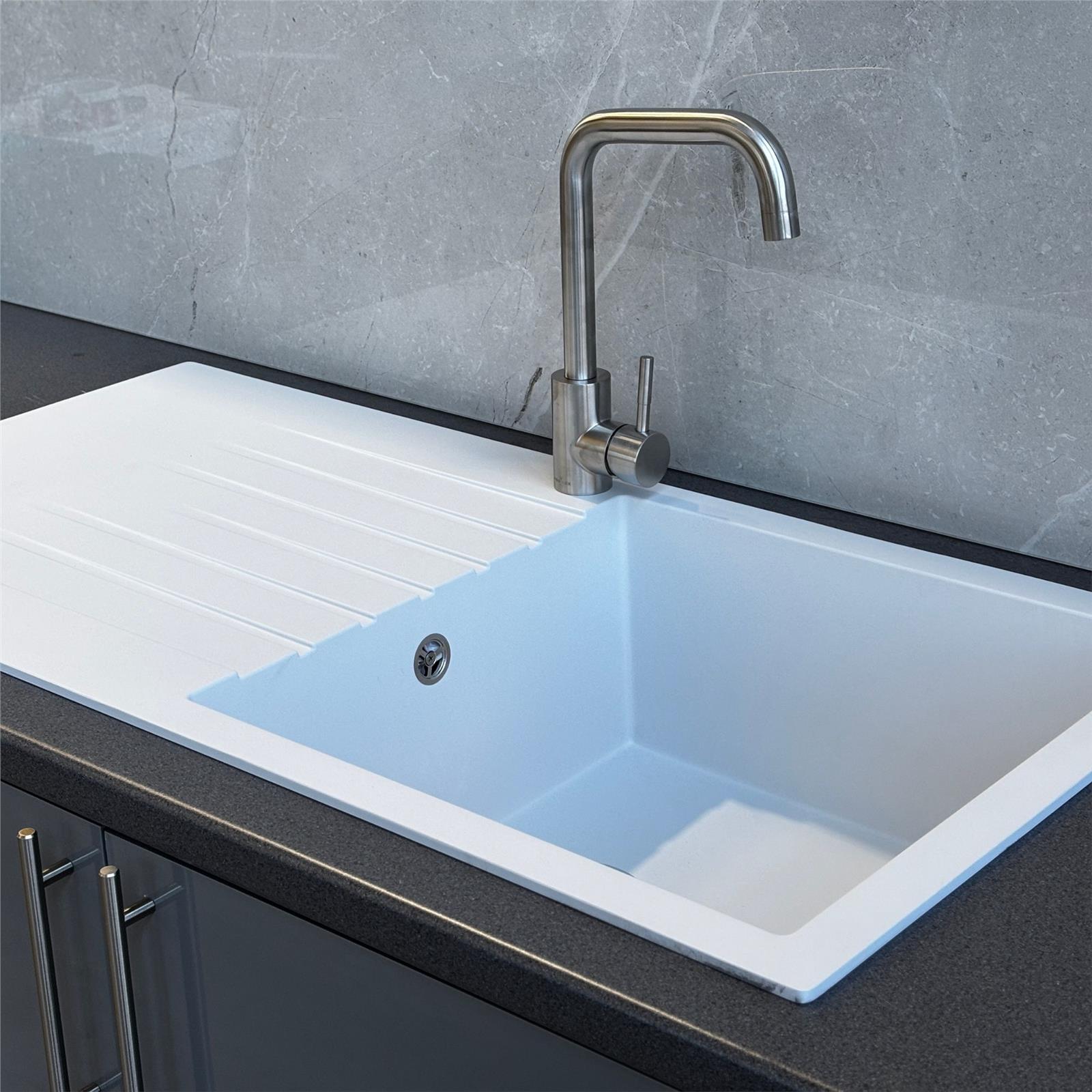 Liquida white granite single bowl kitchen sink with reversible drainer installed in modern kitchen