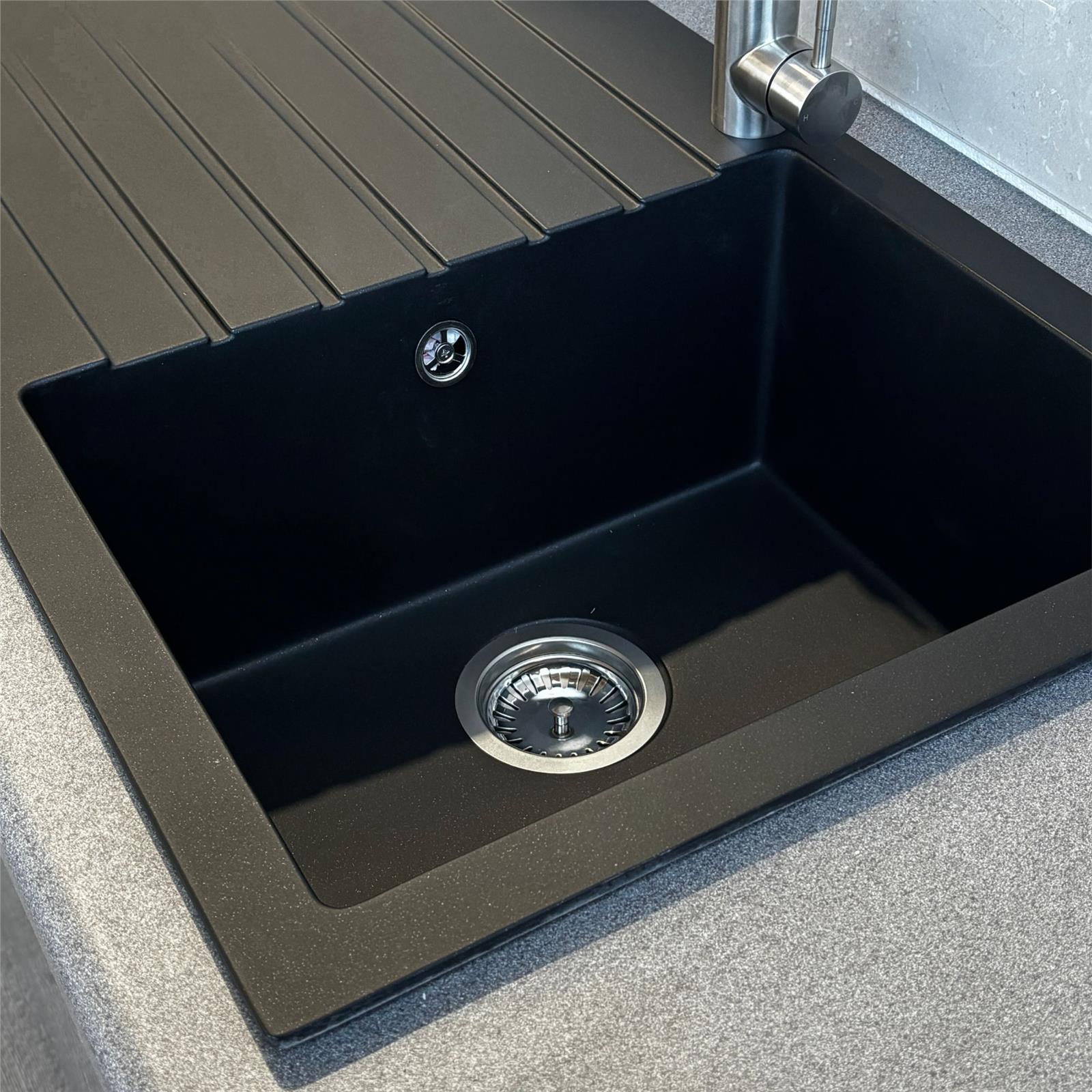 Liquida black granite single bowl kitchen sink with reversible drainer surface texture detail