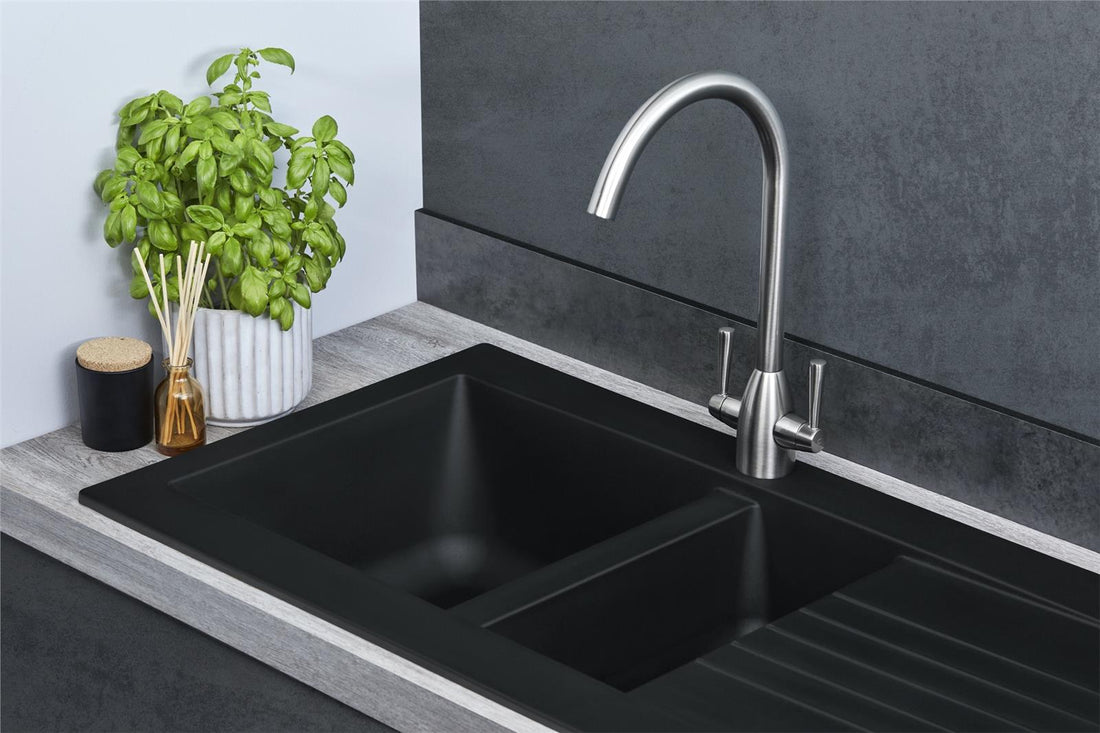Liquida black composite 1.5 bowl kitchen sink with reversible drainer and chrome pull out spray tap small bowl close up