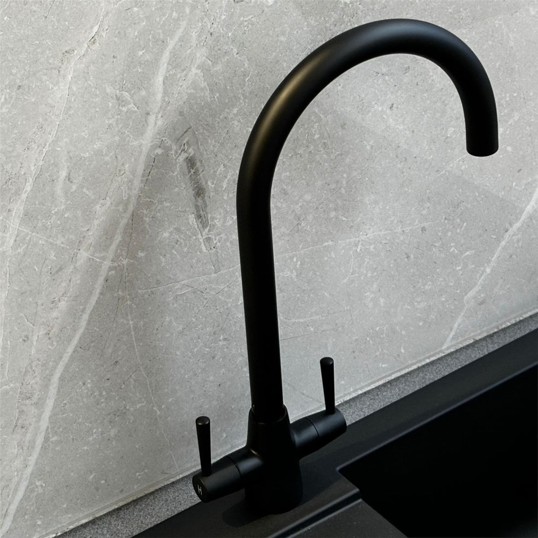 Liquida black composite 1.5 bowl kitchen sink with reversible drainer and black mixer tap drainer grooves detail